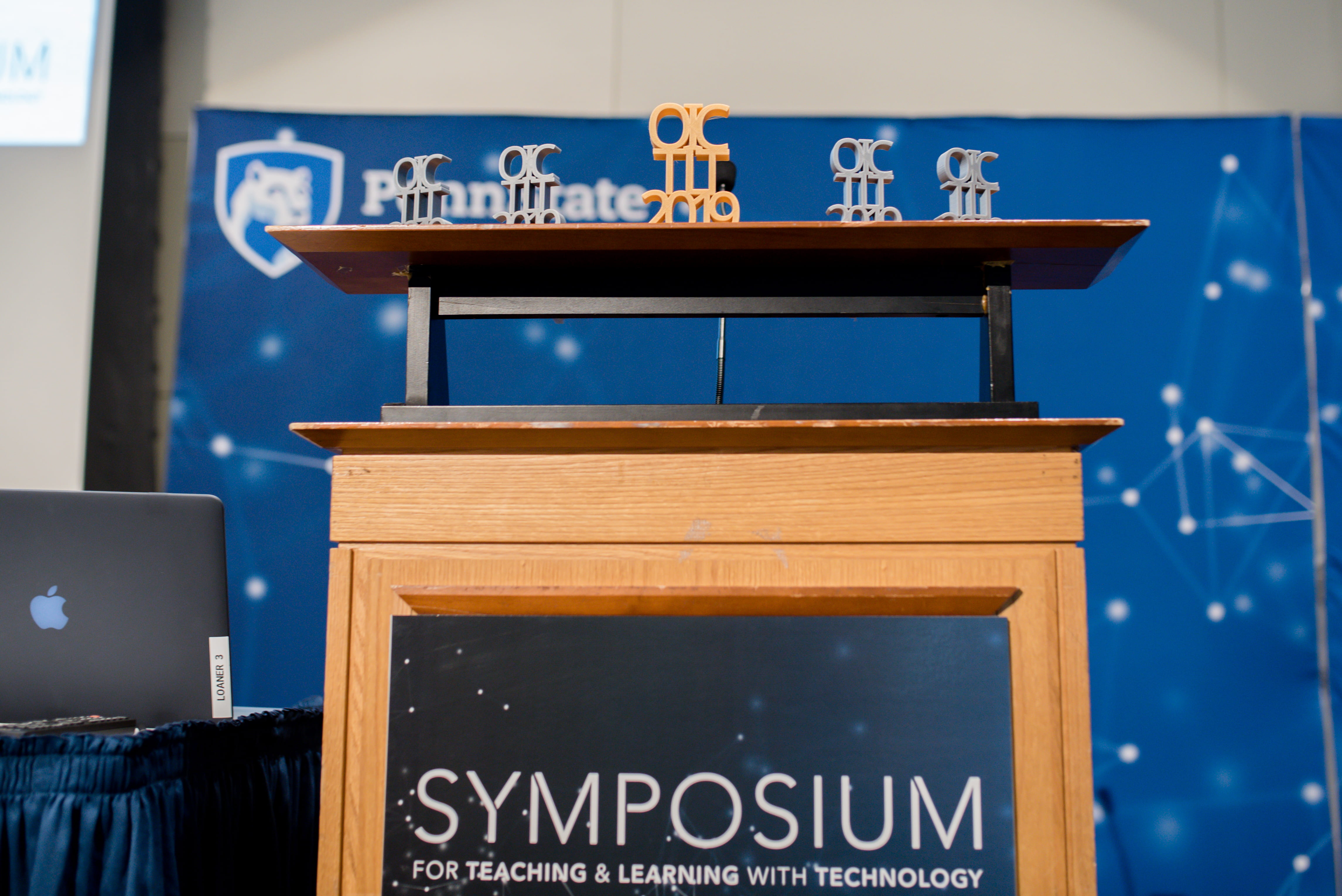 Speaker Podium with a Symposium sign